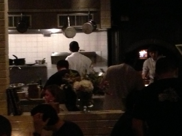 Chefs at work in the open kitchen.