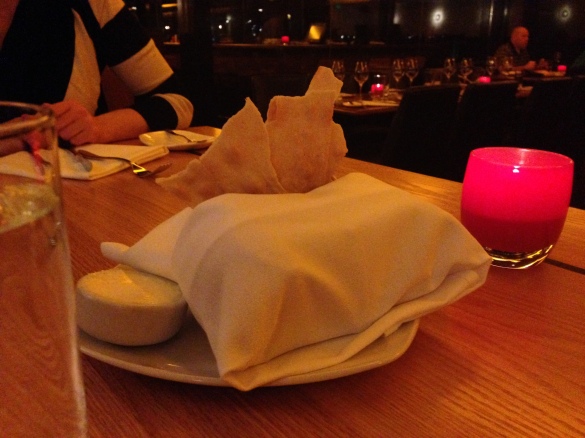 Our complimentary bread basket, playing coy with a few errant crackers sticking up.