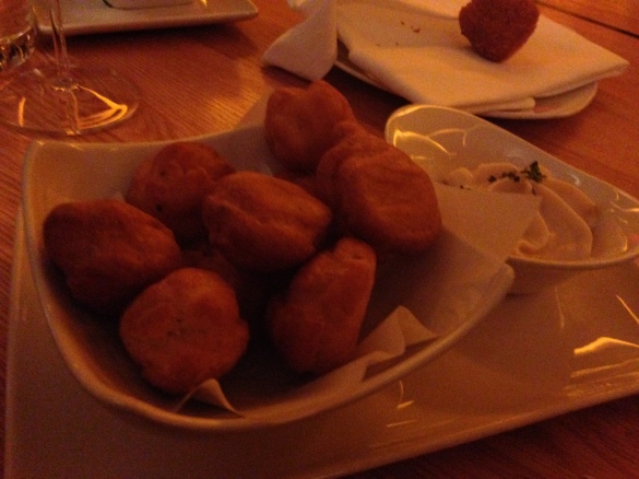 The Warm Rosemary Gougeres, bite size pastries with unreal gruyere dipping sauce.