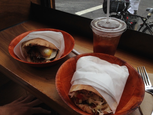 Our cozily wrapped sandwiches -- Falafel on the right, Sabich on the left.