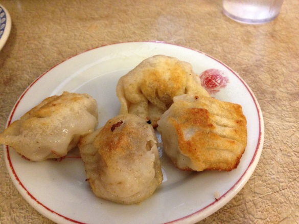 House Special Pan Fried Dumplings from Nom Wah Tea Parlor, one delicious part of their extensive dim sum menu.